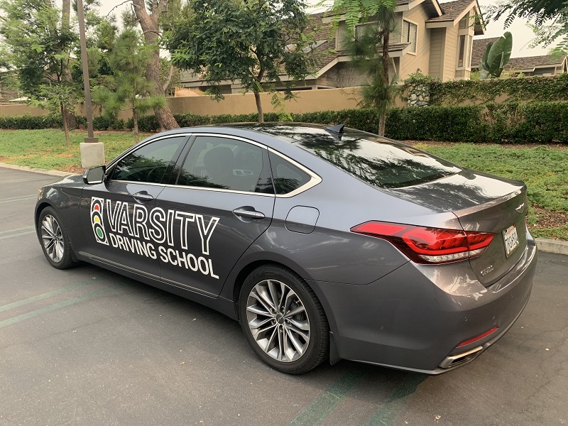 Santa Ana Driving School Training Vehicle Parked in a Parking Lot