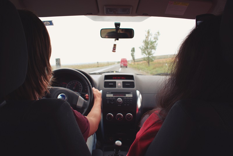 Tustin Driving Lessons Tips to Prepare View from the Backseat of a Car with a Driver and a Passenger in the Front