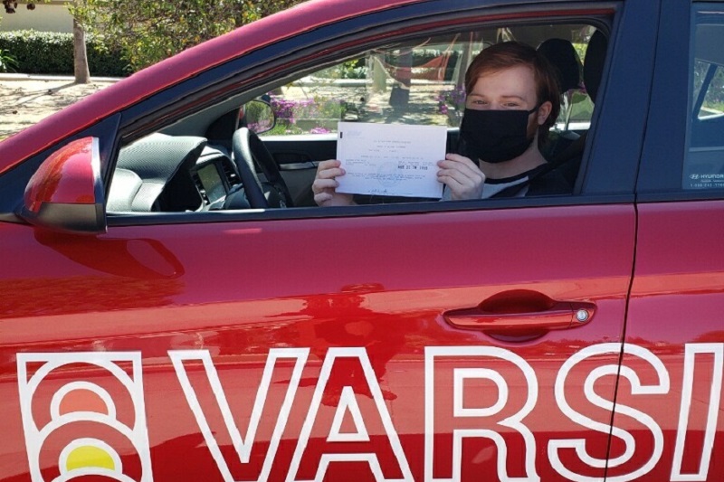 Best Estancia High School Driving School Student Sitting in a Training Vehicle