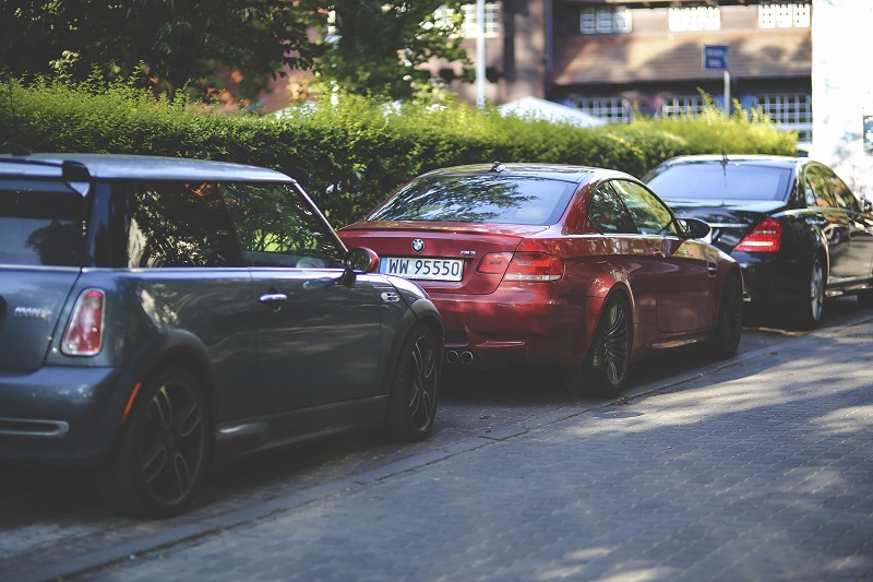 Parallel Parking Steps View of Three Cars Parked Along a Bush