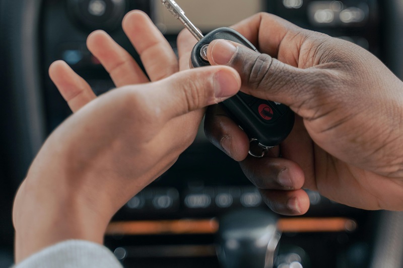 Best Santa Rosa Academy Behind the Wheel Training a Parent Handing Over a Key to Their Teen in a Car