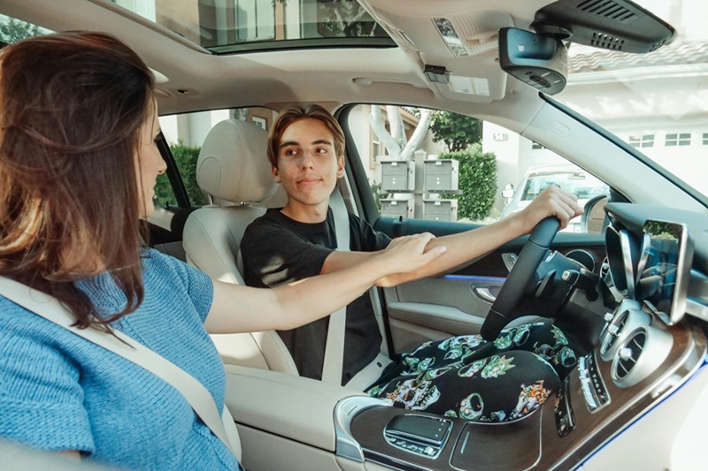 Best Middle College High School Driving School A Mother Teaching Her Son to Drive in a Car