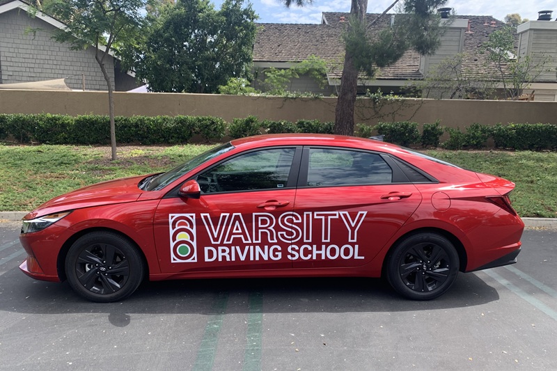 Best Canyon High School Behind the Wheel Training a Training Vehicle Parked in a Parking Lot