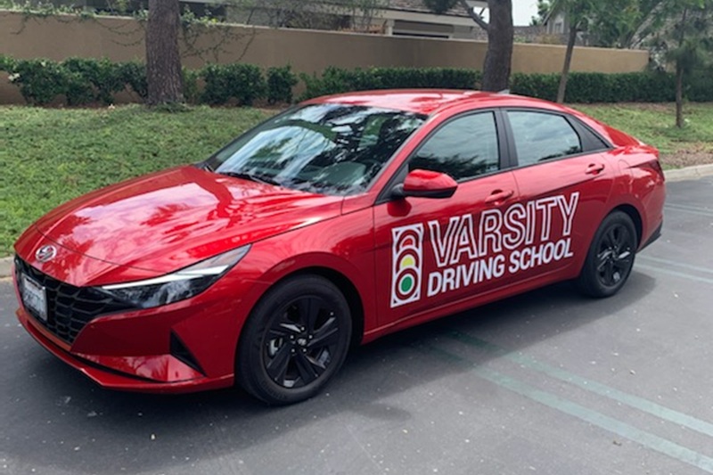 Best Futures Academy Driving School Training Vehicle Parked in a Parking Lot